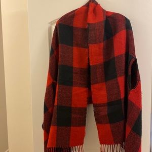 Reversible poncho/wrap with arm holes